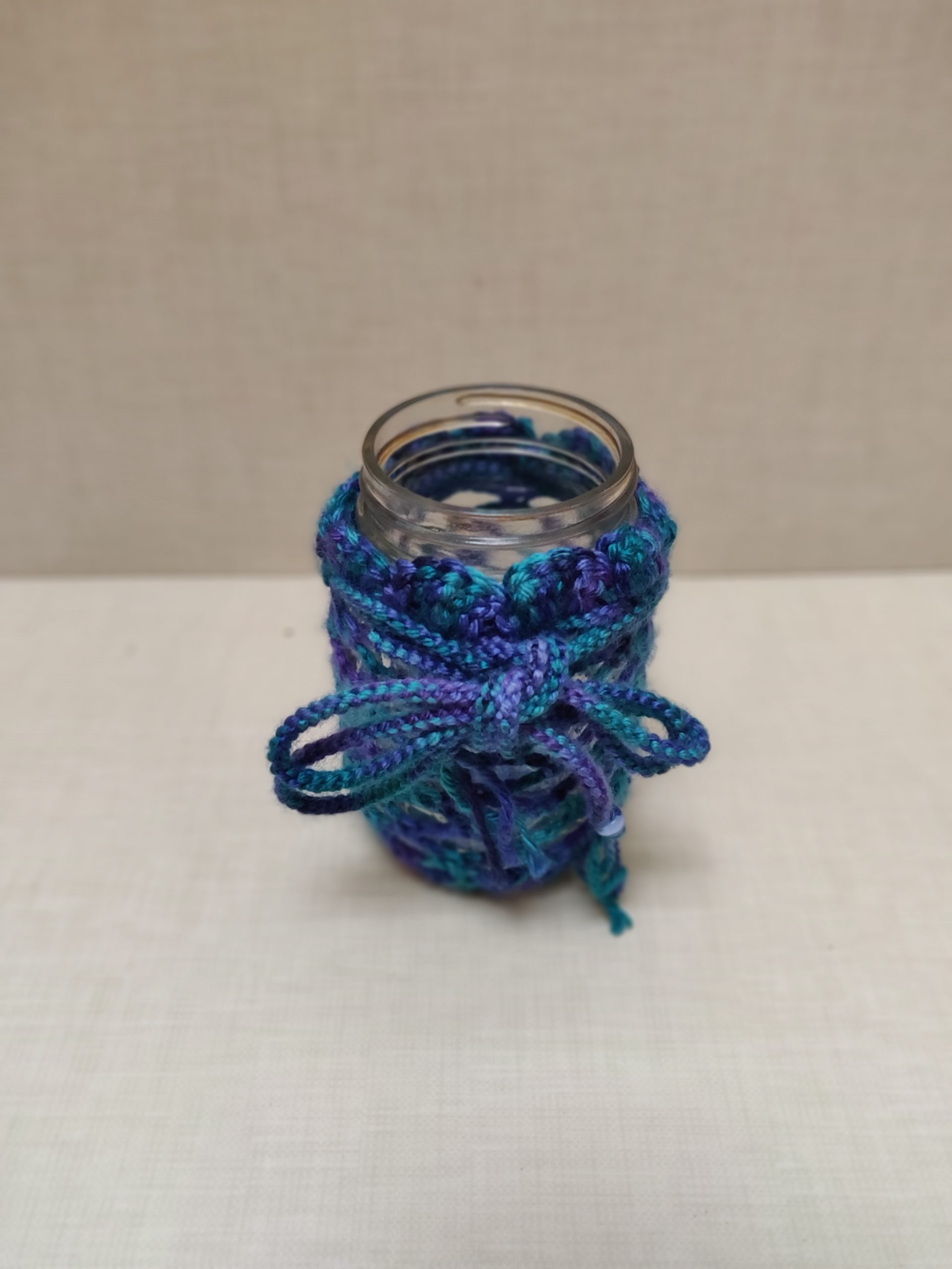 Mason jar cozy with a bow